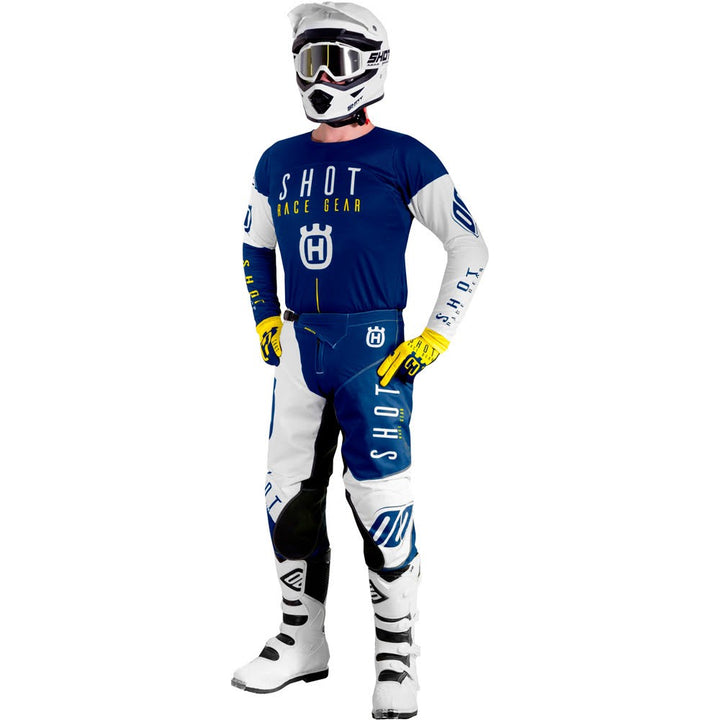 calcas-aerolite-husqvarna-azul-amarela-equipamento